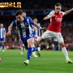 Arsenal sukses melaju ke ke perempat final Liga Champions untuk kali pertama dalam 14 tahun usai menyingkirkan FC Porto lewat adu penalti.