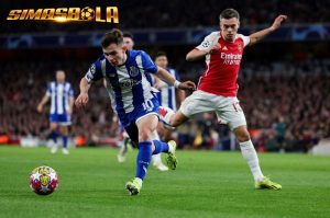 Arsenal sukses melaju ke ke perempat final Liga Champions untuk kali pertama dalam 14 tahun usai menyingkirkan FC Porto lewat adu penalti.