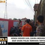 Keberadaan seorang driver ojek online (ojol) tertunduk tak bergerak di atas motor terparkir membuat warga heboh.